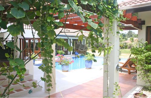 Swimming pool and gardens of one of the villas