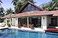 View over the swimming pool to guest bedrooms