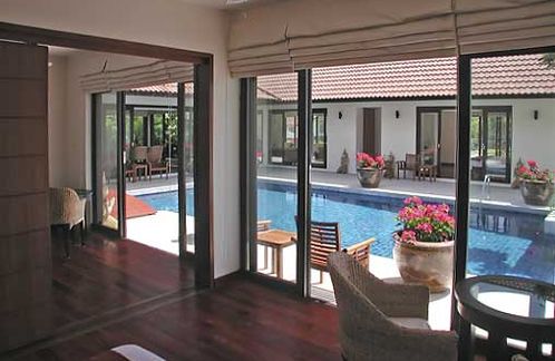 The guest bedrooms, with dividing partition drawn back