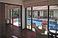 The guest bedrooms, with dividing partition drawn back