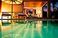 The pool and living room at dusk