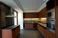 Living room by day, with master bedroom on the right