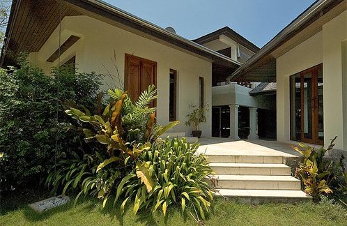 The master bedroom (left) and living room (right)
