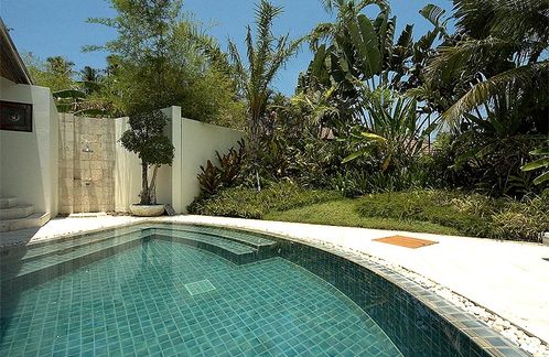 The swimming pool viewed from the gardens