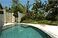 The swimming pool viewed from the gardens